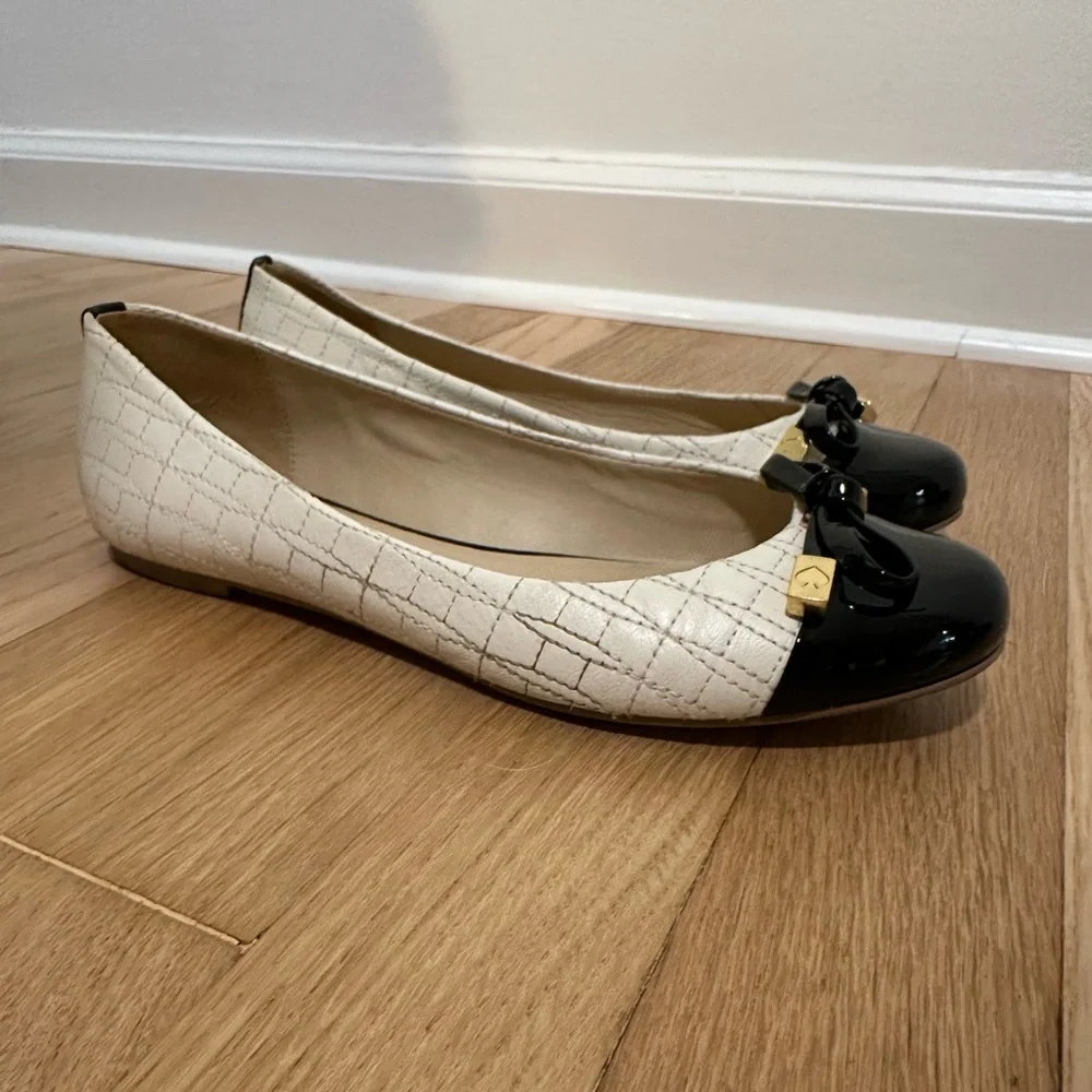 Kate Spade black/white ballet flats with bow accents